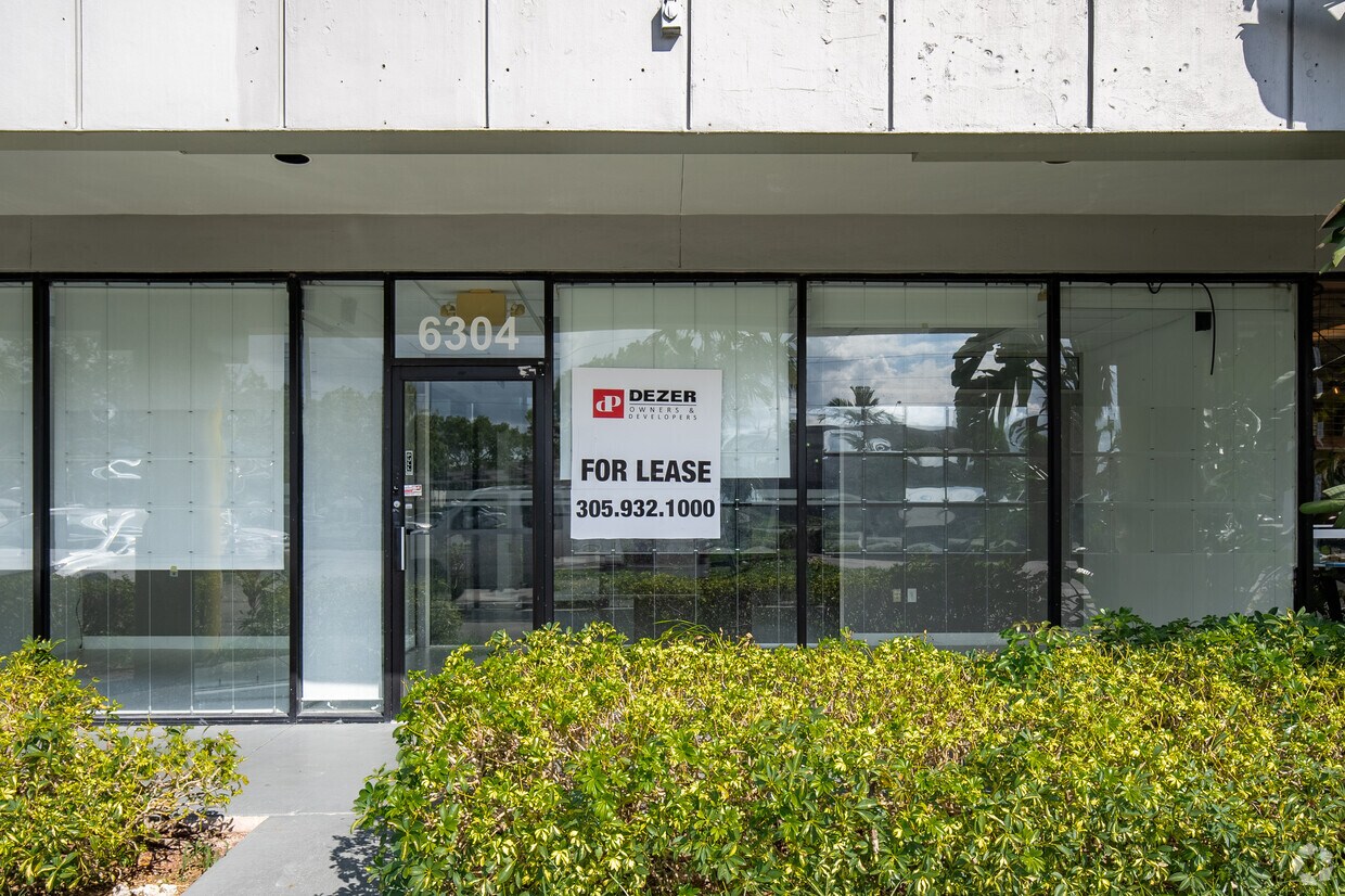 Unit 6304 storefront exterior with landscaping