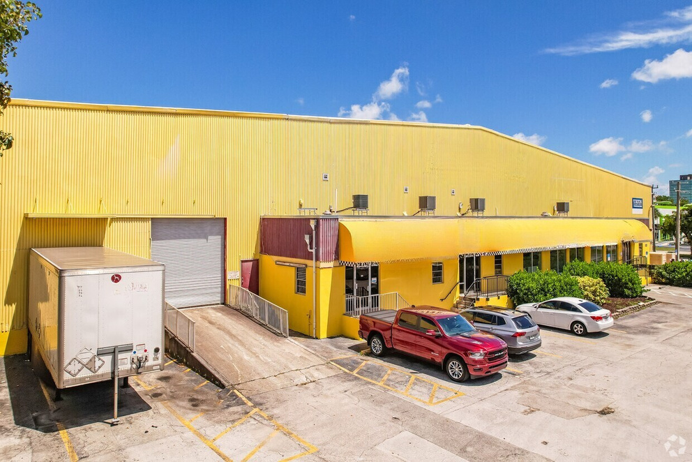 Exterior of 6520 Powerline Road warehouse with loading area