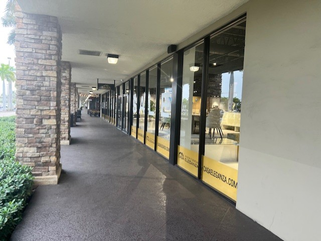 Covered breezeway entrance outside the showroom