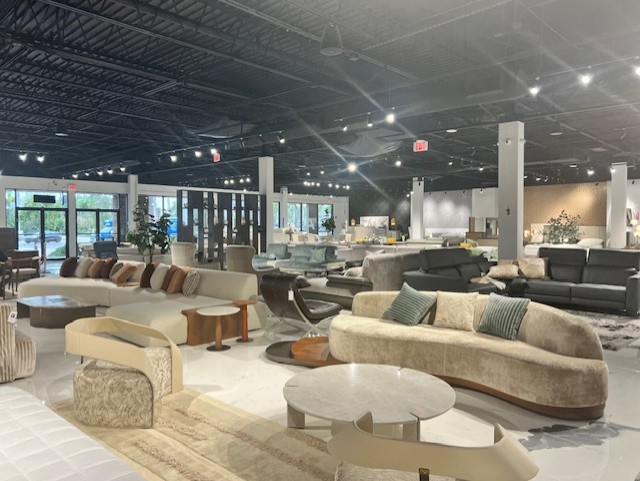Full furniture showroom floor with sofas and seating displays