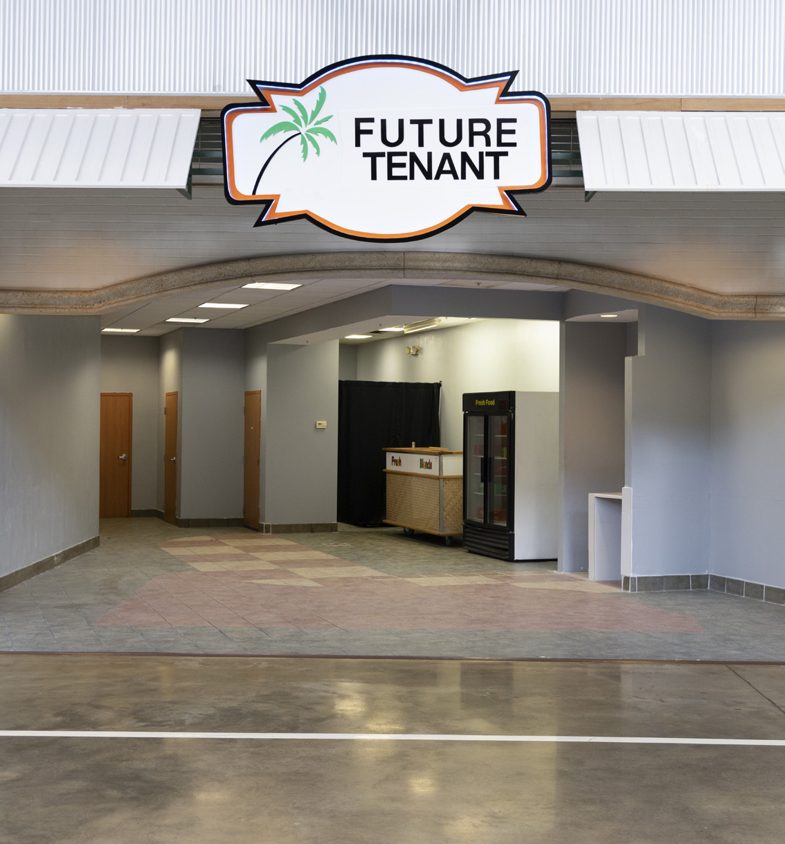 Unit D14 storefront with Future Tenant signage