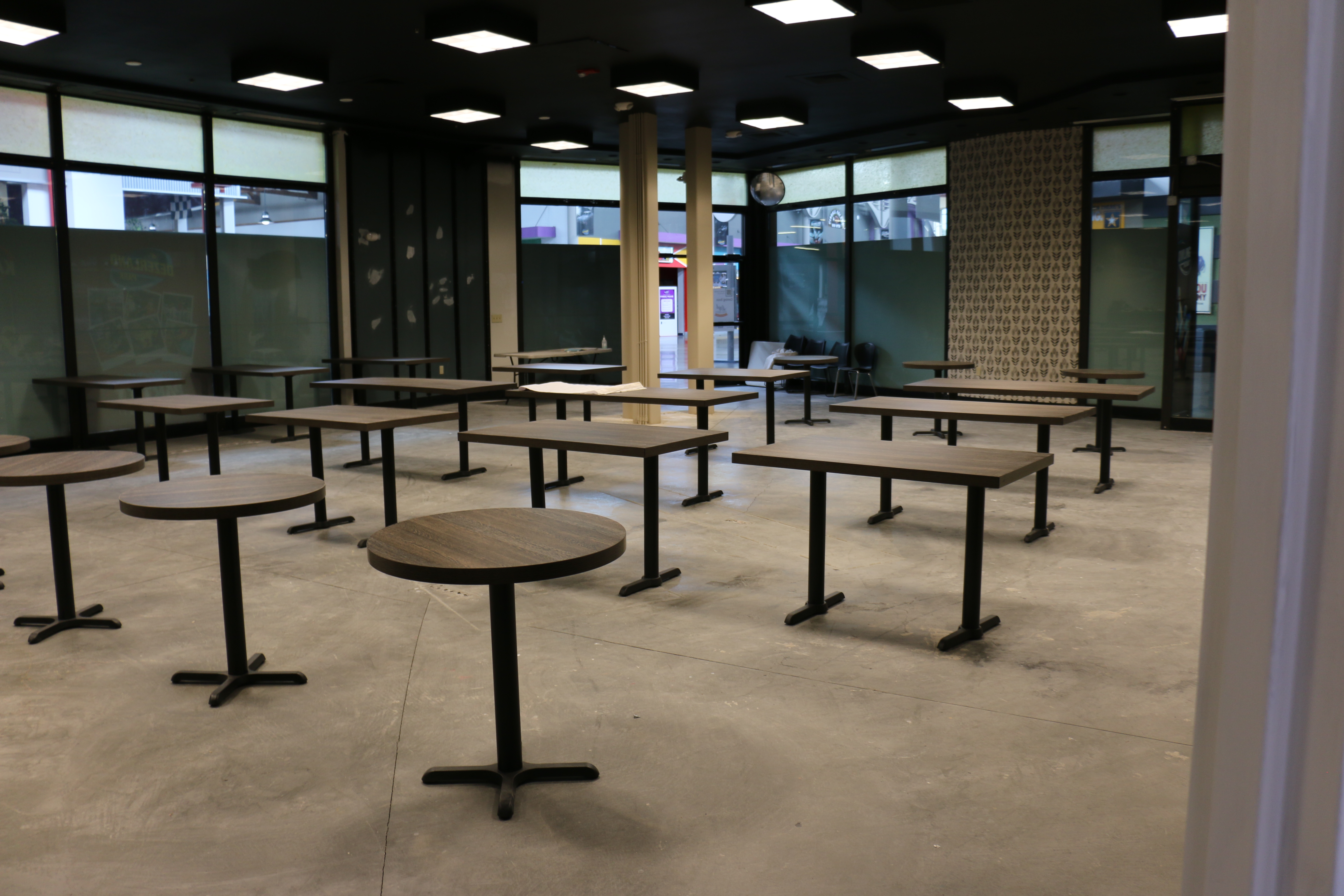 Interior seating area facing Dezerland arcade signage