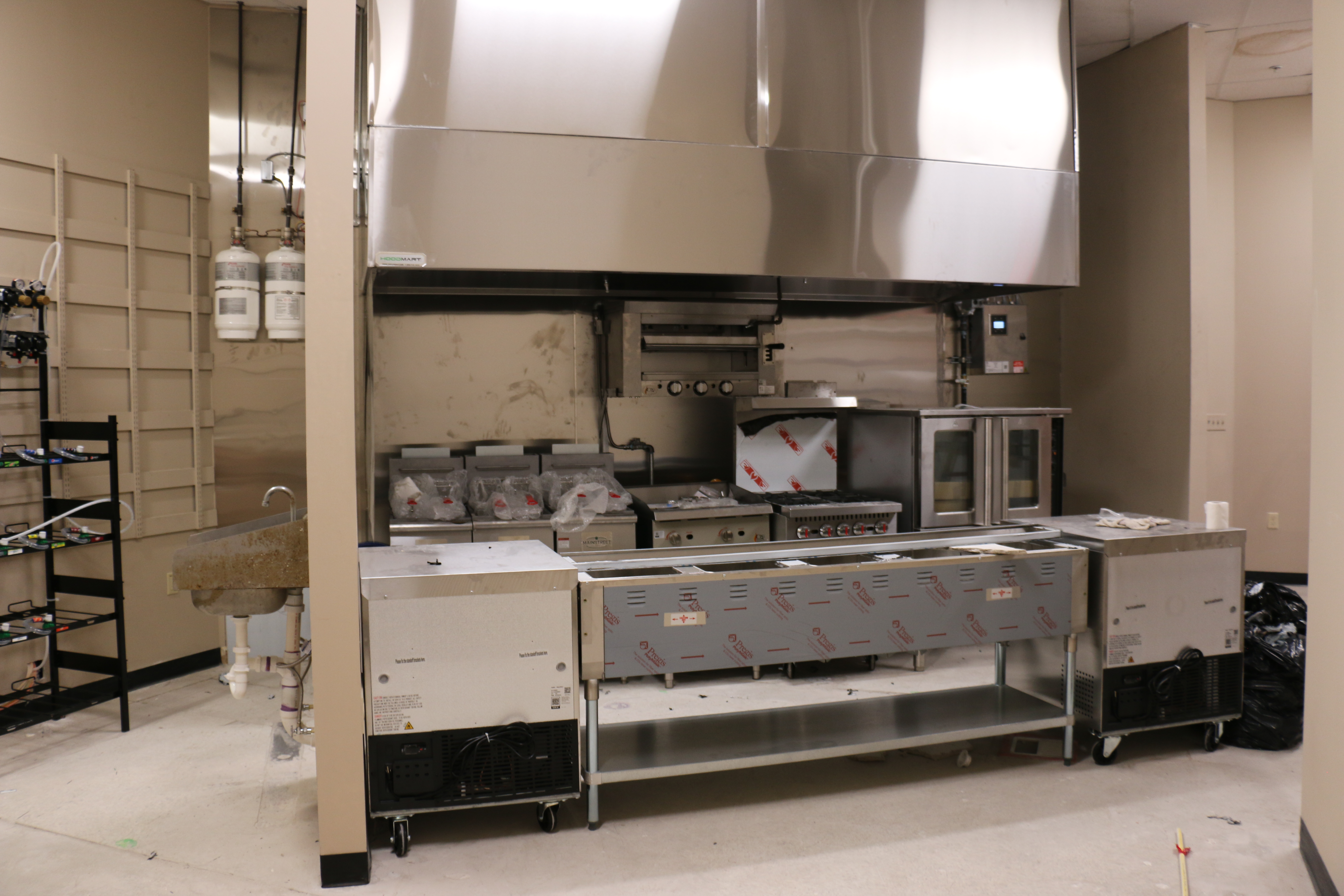 Commercial kitchen equipment inside Unit G22